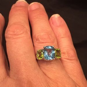 Peridot and blue topaz 14 k white gold ring.
